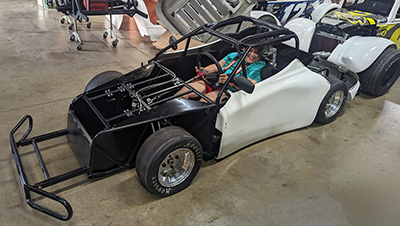 Thomas in his bandolero car with body panels removed