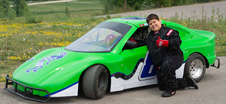 Thomas with his car